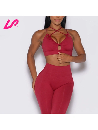 Cover up in style with our criss cross sports bra. Designed for comfort and support, it's a must-have for any workout wardrobe. Shop now and stay ahead of the trend.
